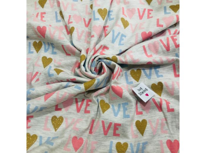 Poppy - Tissu Jersey de Coton Imprimé "Glitter LOVE" sur le Fond Gris Chiné