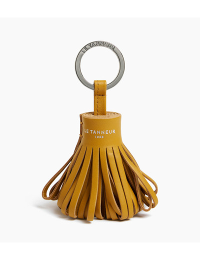 Porte clés pompons en cuir lisse