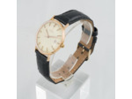OMEGA Classique or R565